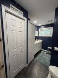 Modern bathroom remodel showcasing a stylish walk-in shower in Schererville, Indiana.