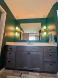 Contemporary bathroom design with a freestanding tub and stylish fixtures.