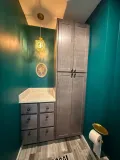 Elegant bathroom design featuring a spacious shower and stylish decor for a modern look.
