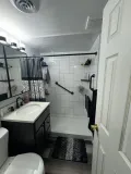 Stylish bathroom renovation in Steger, Illinois, showcasing safety features for family comfort.