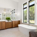 remodel in large bathroom with big windows