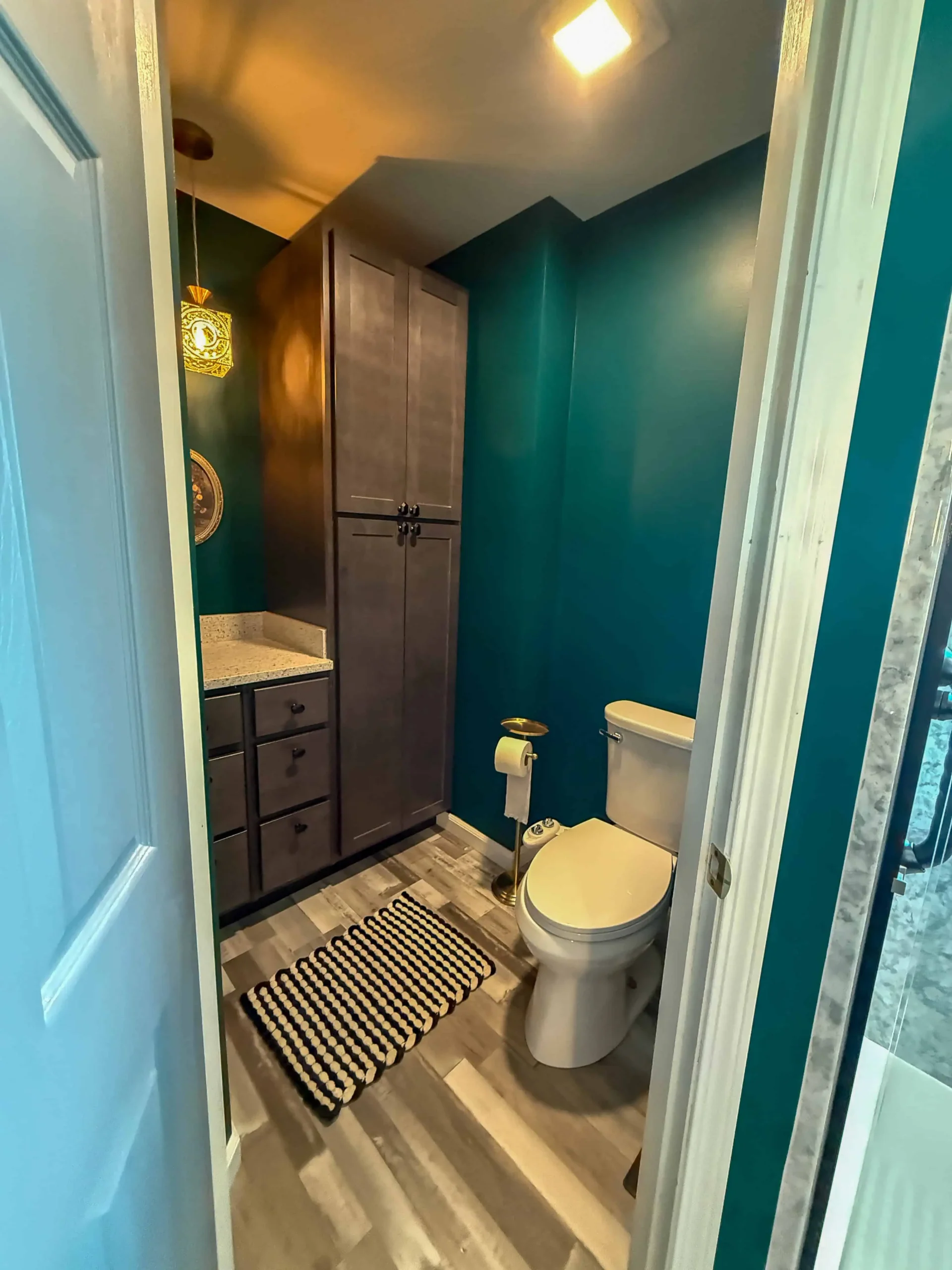 Bright bathroom remodel with a spacious shower and modern design elements.