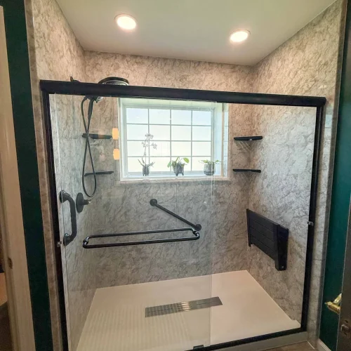 Refreshed bathroom space featuring modern amenities and improved usability.