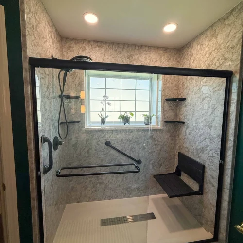 Modern bathroom remodel featuring a spacious shower and freestanding tub for relaxation.