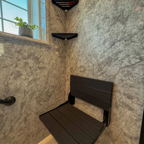 Modern bathroom remodel featuring a spacious freestanding tub and stylish storage solutions.