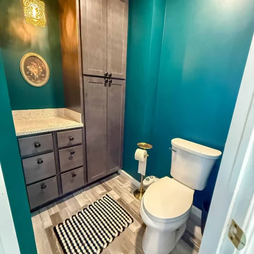 Contemporary bathroom featuring a freestanding tub and organized storage for a functional space.