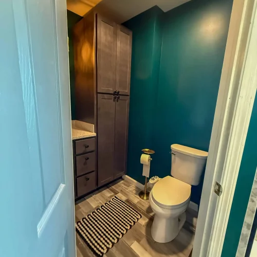 Elegant bathroom design with a spacious shower area and modern fixtures for improved usability.
