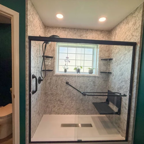 Modern bathroom remodel featuring a spacious shower and freestanding tub for enhanced functionality.