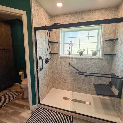 Contemporary bathroom with a relaxing freestanding tub and stylish shower area.