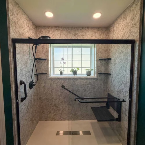 Chic bathroom remodel featuring a spacious layout and modern fixtures for comfort.