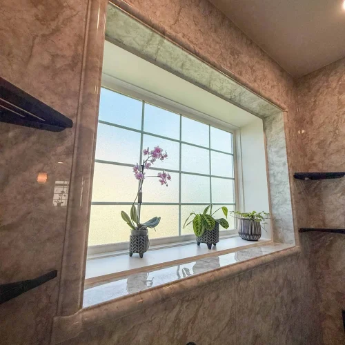 Stylish bathroom renovation with updated storage solutions and a contemporary design.