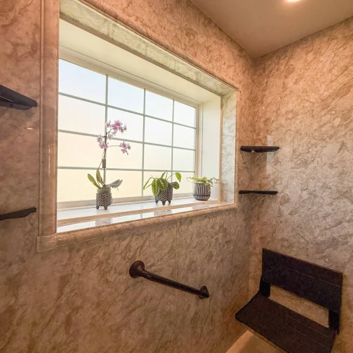 Modern bathroom remodel featuring a spacious shower and freestanding tub for relaxation.