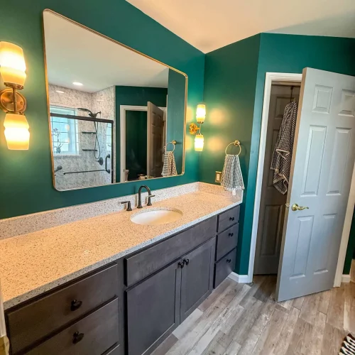 Elegant bathroom with a freestanding tub and modern fixtures for enhanced comfort.