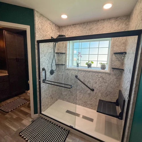 Updated bathroom design with a focus on accessibility and modern amenities for the Plys family.